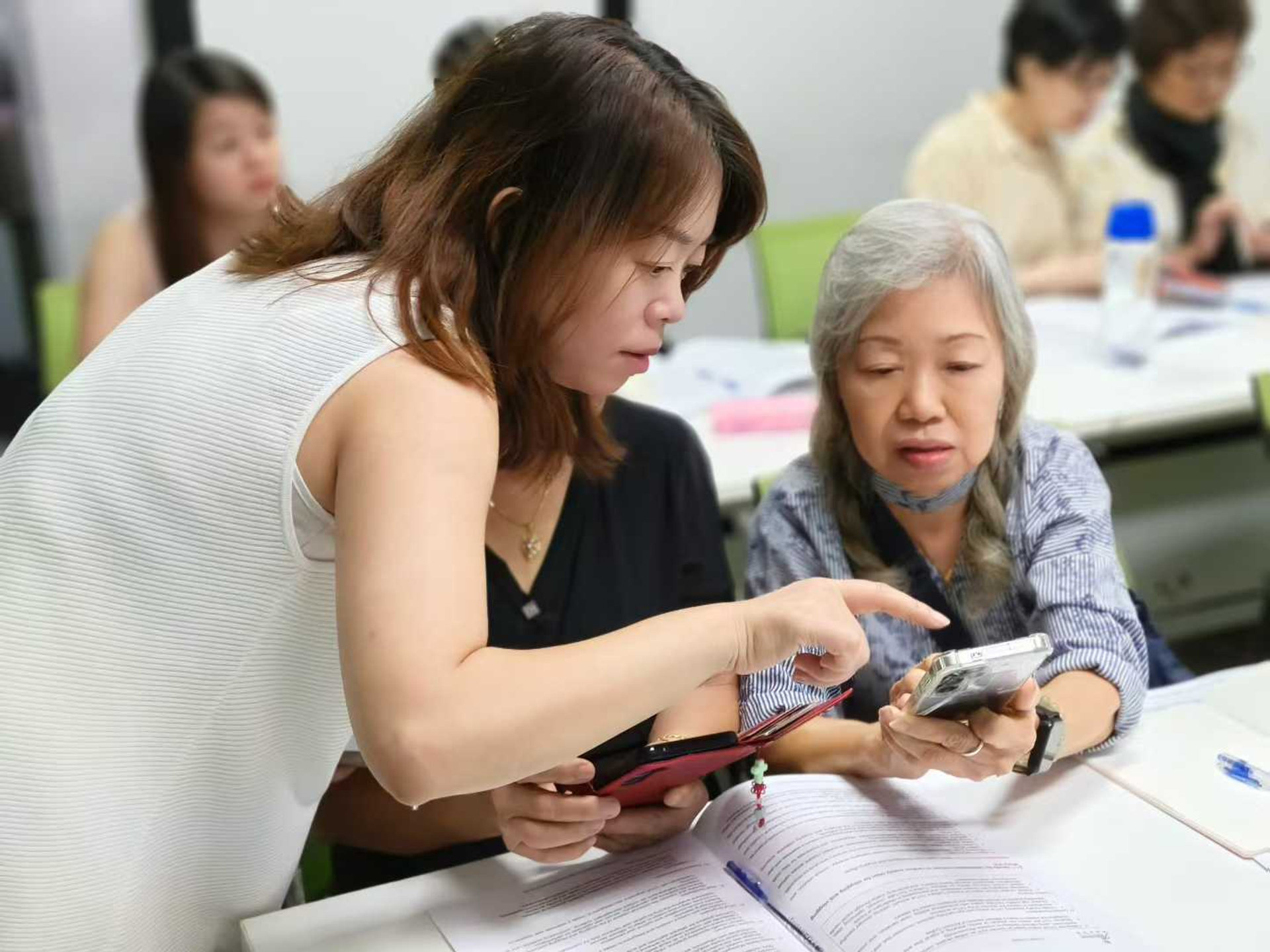 Participants engaged in AI training workshop activities